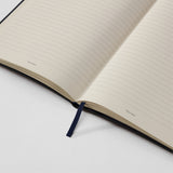 355902_TREU_Notizbuch_M_medium_schwarz_Lineatur_LINIERT_2500x2500